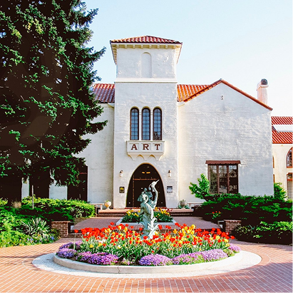 White building with red tile roof