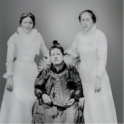 Black and white photo of three women.